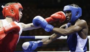 Hamza Kramou of Algeria, left, fights Yordenis Ugas of