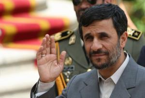 Iranian President Mahmoud Ahmadinejad waves upon the arrival of