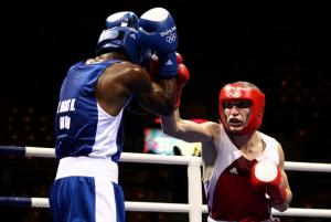 BEIJING - AUGUST 11:  Yordenis Ugas (blue) of