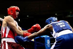 BEIJING - AUGUST 11:  Yordenis Ugas (blue) of
