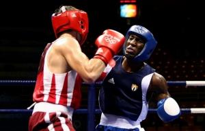 BEIJING - AUGUST 11:  Yordenis Ugas (blue) of