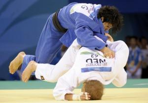 Algeria's Kahina Saidi (top) and Netherlands Elisabeth Willeboordse compete