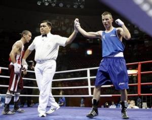 Abdelhalim Ourradi, left, of Algeria looks away as