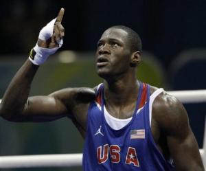 USA's Deontay Wilder reacts after defeating Abdelaziz Touilbini of