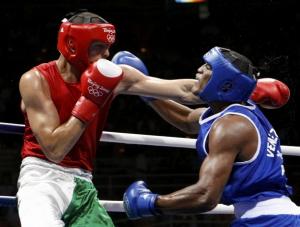 Newfel Ouatah (L) of Algeria fights Jose Payares of