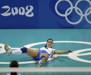 Manuela Secolo of Italy falls during their women's preliminary