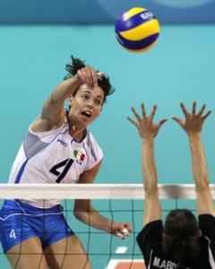 Italy's Nadia Centoni, left, spikes against Algeria during their