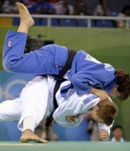 Algeria's Rachida Ouerdane (top) and Netherlands Edith Bosch compete