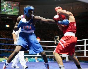 US boxer Deontay Wilder (L) fights against Algeria's Abdelaziz