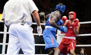 US boxer Deontay Wilder (L) fights against Algeria's Abdelaziz