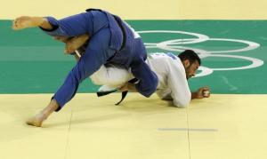 Georgia's Irakli Tsirekidze (L) and Algeria's Amar Benikhlef compete