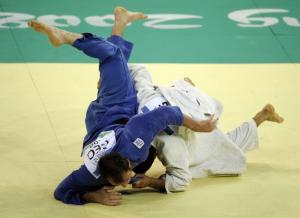 Georgia's Irakli Tsirekidze (L) and Algeria's Amar Benikhlef compete