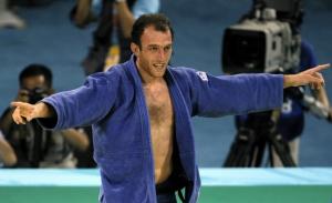 Georgia's Irakli Tsirekidze celebrates after winning the gold against
