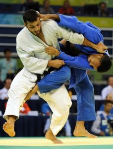 France's Yves-Matthieu Dafreville (R) and Algeria's Amar Benikhlef compete