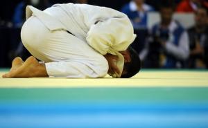 Algeria's Amar Benikhlef reacts after winning his fight against