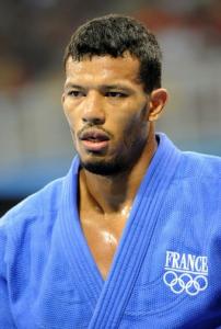 France's Yves-Matthieu Dafreville looks dejected after being defeated by