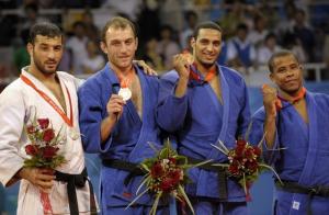 Georgia's Irakli Tsirekidze (2ndL), gold medal, Algeria's Amar Benikhlef