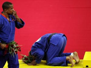 Switzerland's Sergei Aschwanden (L) and Egypt's Hesham Mesbah celebrate