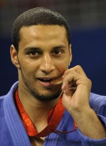 Egypt's Hesham Mesbah poses with his bronze medal on