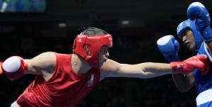 Algeria's Newfel Ouatah (L) fights against Venezuela's Jose Payares