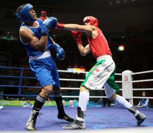 Algeria's Newfel Ouatah (R) fights against Venezuela's Jose Payares