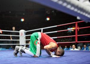 Algeria's Newfel Ouatah gives thanks following his victory over