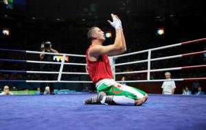 Algeria's Newfel Ouatah gives thanks following his victory over