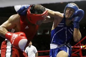 Ramadan Yasser (L) of Egypt fights Abdelhafid Benchabla of