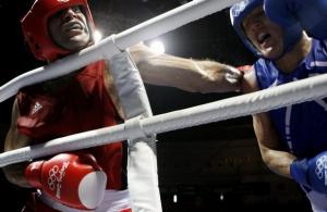 Ramadan Yasser (L) of Egypt fights Abdelhafid Benchabla of