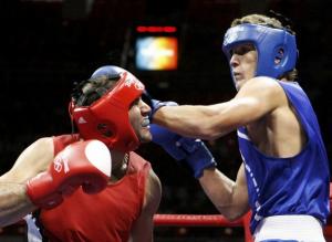 Ramadan Yasser (L) of Egypt fights Abdelhafid Benchabla of