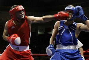 Ramadan Yasser (L) of Egypt fights Abdelhafid Benchabla of