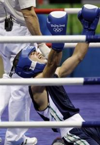 Abdelkader Chadi of Algeria, reacts after beating Adi Sailom