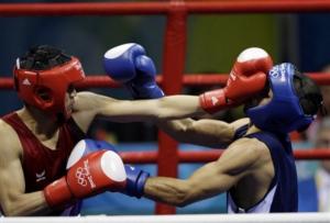Adi Sailom, left, of Thailand, battles Abdelkader Chadi of