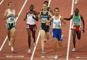Mehdi Baala of France, second right, wins a heat