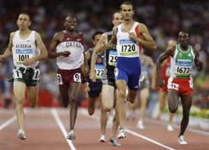 Mehdi Baala of France, second right, wins a heat