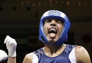 Nabil Kassel of Algeria reacts as a referee makes