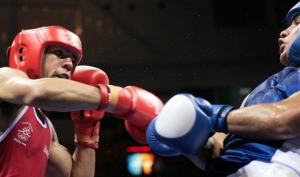Ireland's Darren Sutherland (L) fights against Algeria's Nabil Kassel