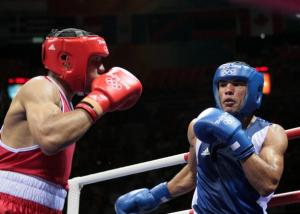 Ireland's Darren Sutherland (L) fights against Algeria's Nabil Kassel