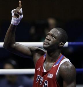 Deontay Wilder of the U.S, reacts after defeating Mohammed