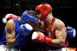 Vyacheslav Glazkov (R) of Ukraine fights Newfel Ouatah of
