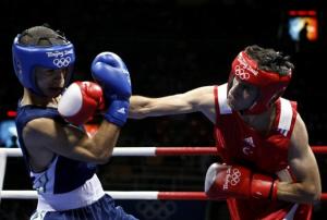 Yakup Kilic (R) of Turkey fights Abdelkader Chadi of