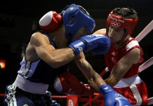 Yakup Kilic (R) of Turkey fights Abdelkader Chadi of