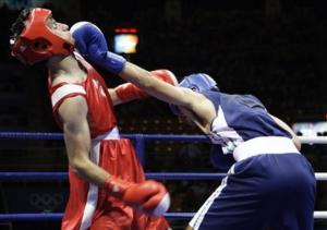 Yakup Kilic of Turkey, left, fights Abdelkader Chadi of