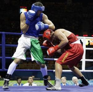 Vyacheslav Glazkov of Ukraine, right, fights Newfel Ouatah of