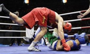Vyacheslav Glazkov of Ukraine, left, fights Newfel Ouatah of