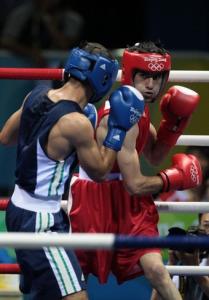 Turkey's Yakup Kilic (R) fights against Algeria's Abdelkader Chadi