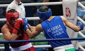 Ukraine's Vyacheslav Glazkov (L) fights against Algeria's Newfel Ouatah
