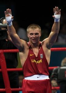 Ukraine's Vyacheslav Glazkov celebrates his victory over Algeria's Newfel