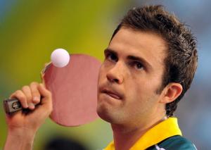 Australia's William Henzell serves to Algeria's Idir Khourta during