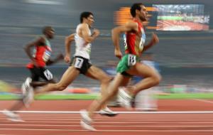 Athletes compete in the men's first round 800m heat